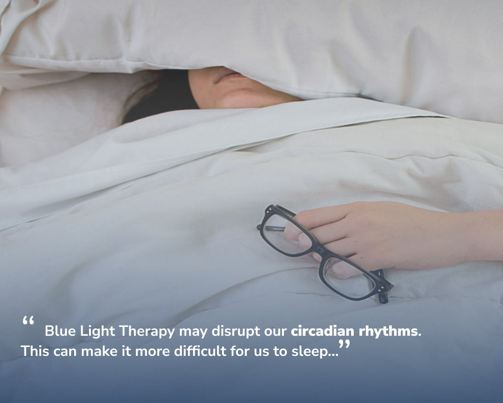 Woman Asleep Under Bed Covers Holding Glasses