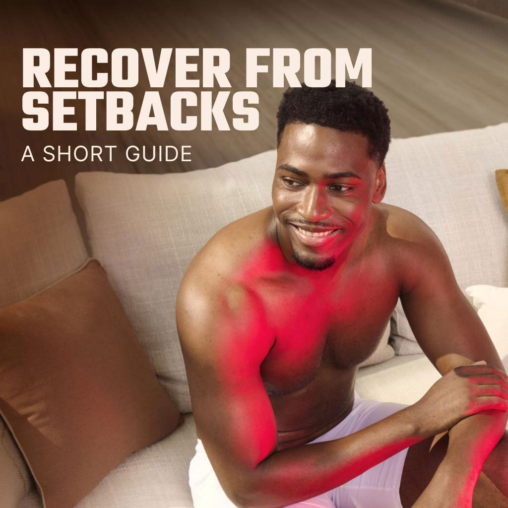 Man With Red Light Glow Sitting On Sofa